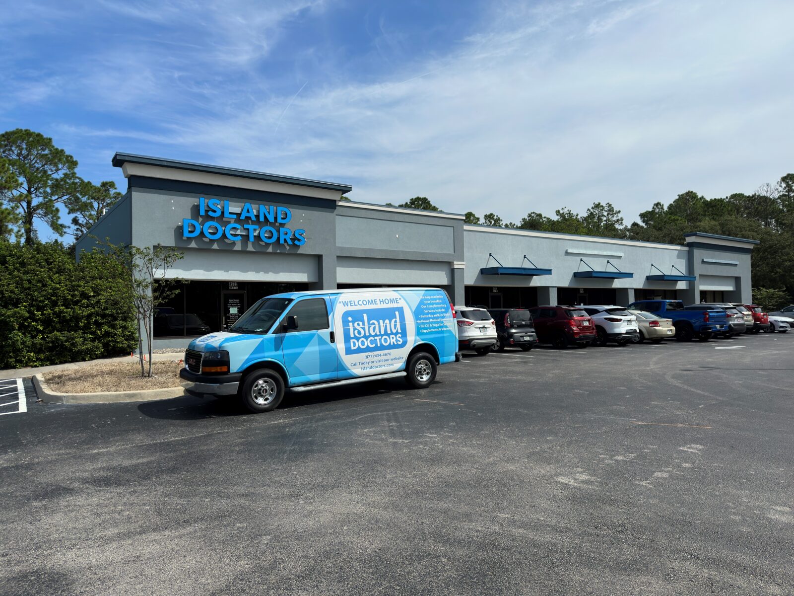 Island Doctors office with a blue Island Doctors van outside
