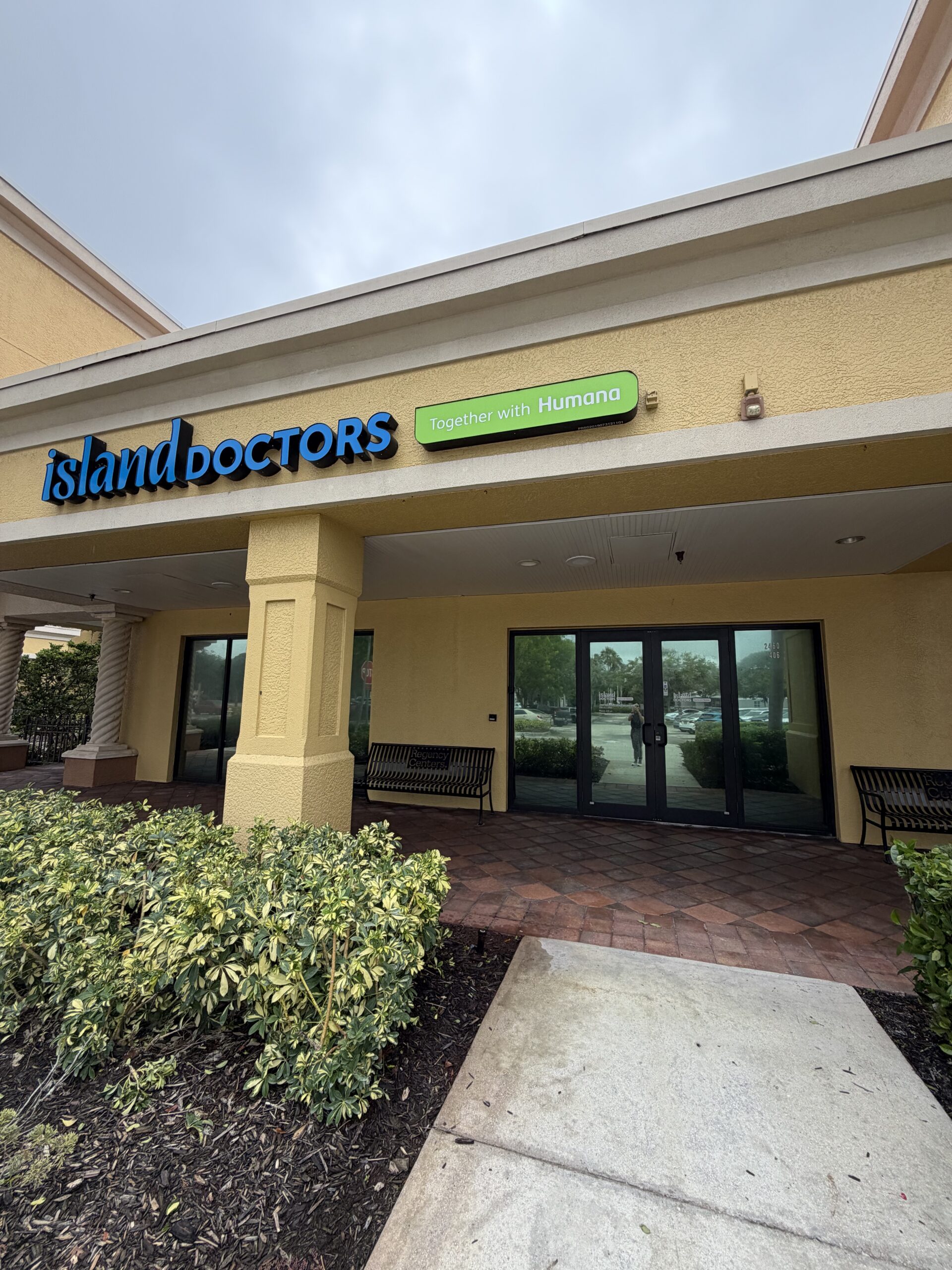 Island Doctors Naples office exterior and entrance at Suite 406